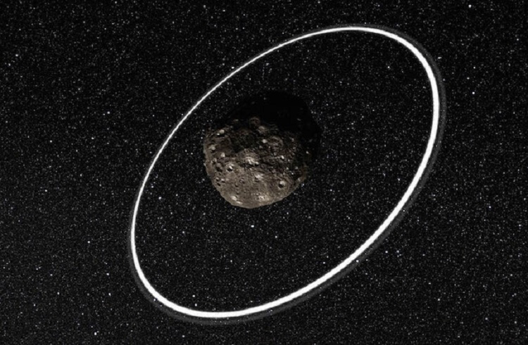 Observations at many sites in South America, including ESO’s La Silla Observatory, have made the surprise discovery that the remote asteroid Chariklo is surrounded by two dense and narrow rings. This is the smallest object by far found to have rings and only the fifth body in the Solar System — after the much larger planets Jupiter, Saturn, Uranus and Neptune — to have this feature. The origin of these rings remains a mystery, but they may be the result of a collision that created a disc of debris. This artist’s impression shows a close-up of what the rings might look like.