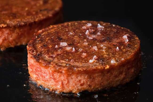 photo of burger with salt on it