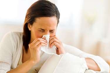 493ss_thinkstock_rf_woman_sneezing_suffering_from_allergies.jpg?resize=375px:250px&output-quality=50