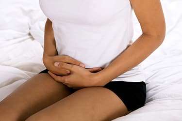 493ss_thinkstock_rf_woman_holding_stomach.jpg?resize=375px:250px&output-quality=50